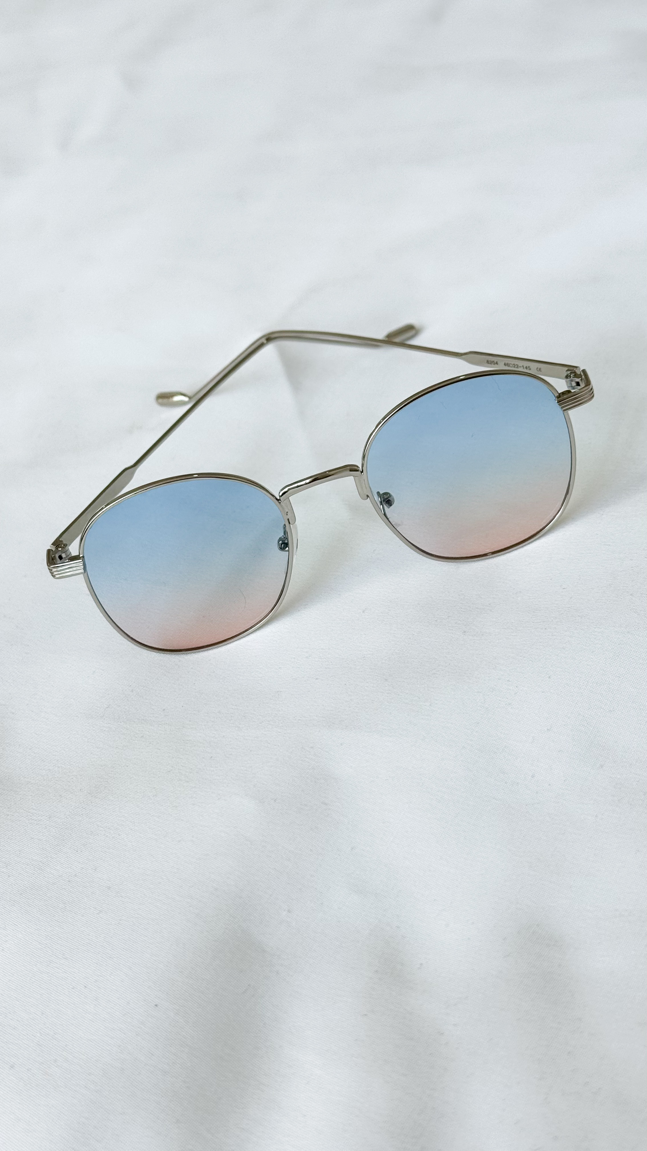 نمای دیگر از عینک گرد فلزی رنگ تک رنگ